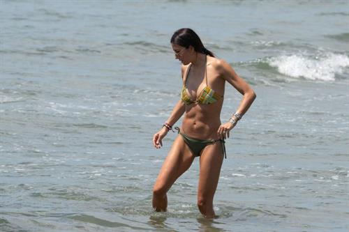Elisabetta Gregoraci sexy ass and cleavage in a bikini at the beach seen by paparazzi.











