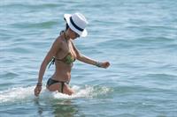 Elisabetta Gregoraci sexy ass and cleavage in a bikini at the beach seen by paparazzi.











