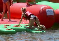 Elsa Pataky sexy ass and cleavage in a swimsuit seen by paparazzi with Chris Hemsworth.














