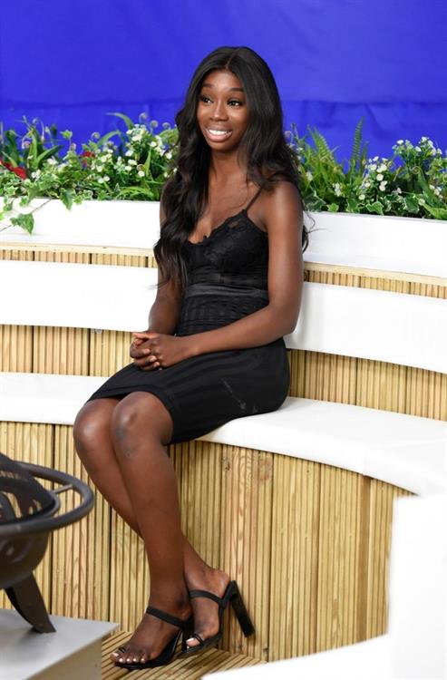 Yewande Biala Pictures Yewande Biala from Love Island sexy in a tight black dress on I Saw It First HQ .