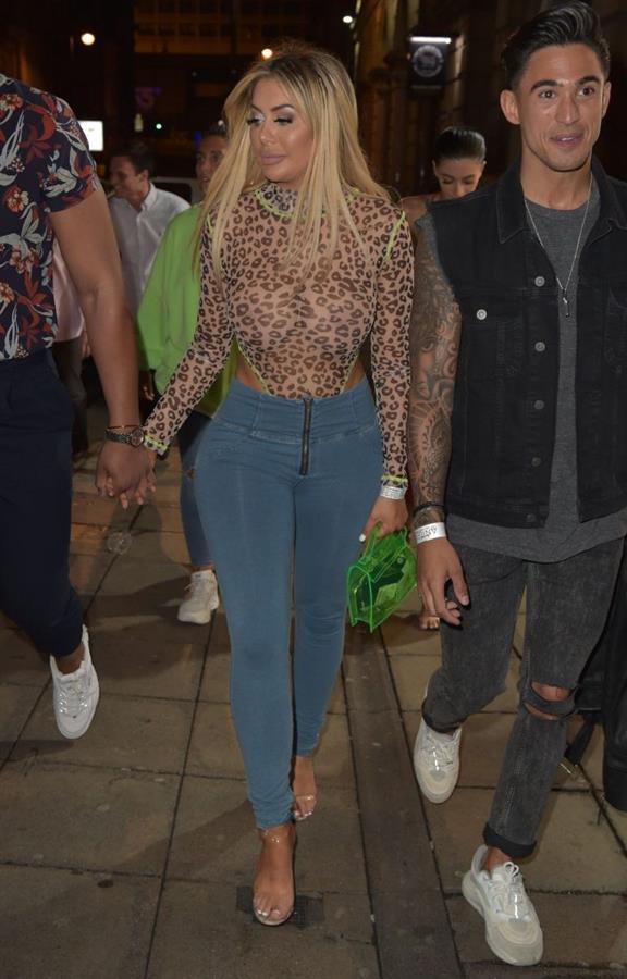 Chloe Ferry braless boobs in a see through top seen by paparazzi showing off her tits and ass.





