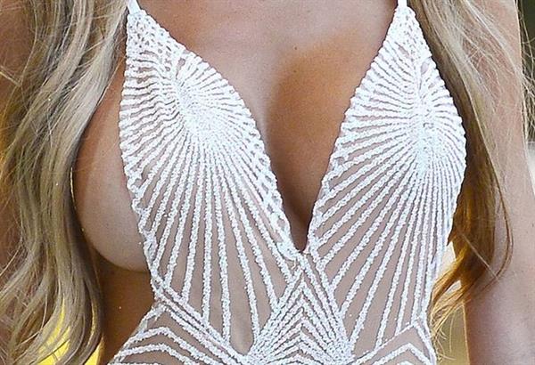 Farrah Abraham braless boobs in a sexy see through dress causing a wardrobe malfunction seen by paparazzi.







