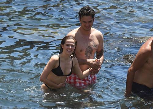 Zoey Deutch Bikini Pictures Zoey Deutch sexy boobs and ass in a little bikini in the water seen by paparazzi.