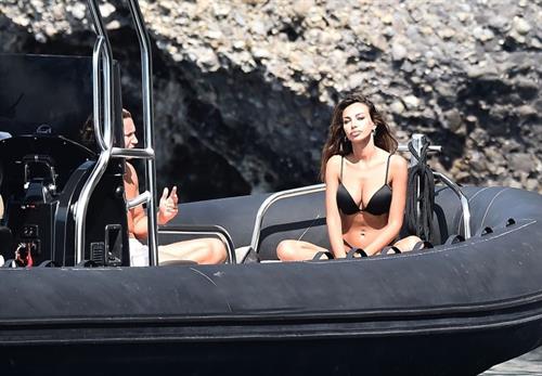 Mădălina Diana Ghenea Bikini Pictures Madalina Diana Ghenea sexy ass and cleavage in a thong bikini seen by paparazzi.