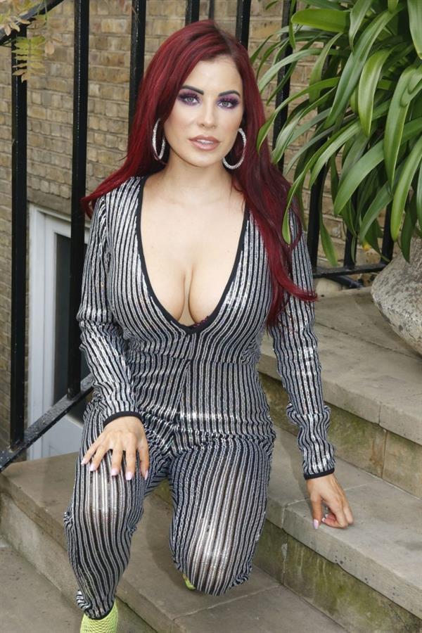 Carla Howe braless boobs showing nice cleavage in London.




