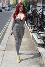 Carla Howe braless boobs showing nice cleavage in London.





