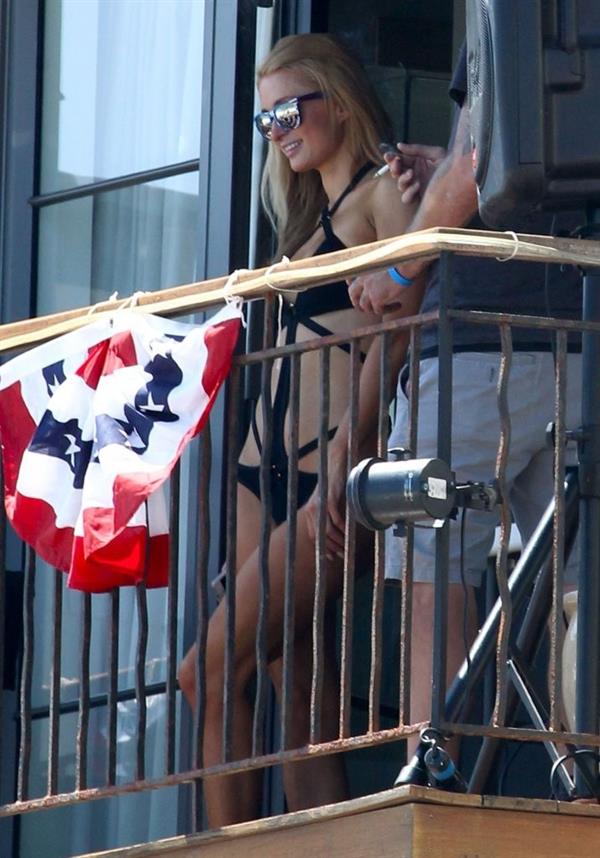 Paris Hilton on a balcony