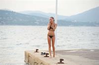 Kimberley Garner at the beach with her dog