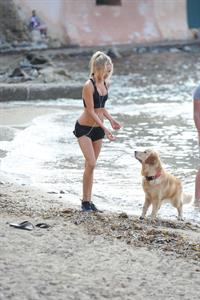 Kimberley Garner at the beach with her dog