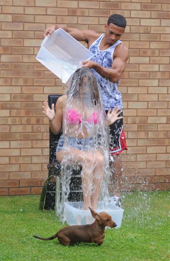 Chloe Goodman gets water dumped on her