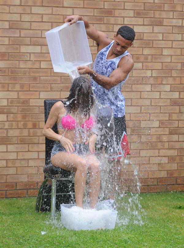 Chloe Goodman gets water dumped on her