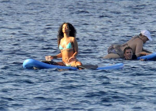 Rihanna paddle boarding