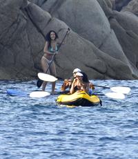 Rihanna paddle boarding