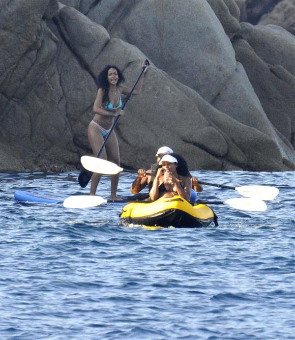 Rihanna paddle boarding