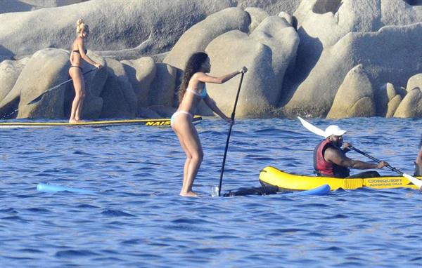 Rihanna paddle boarding