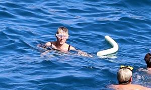 Kristen Stewart and Stella Maxwell sexy lesbians making out on a boat in bikinis seen by paparazzi.










