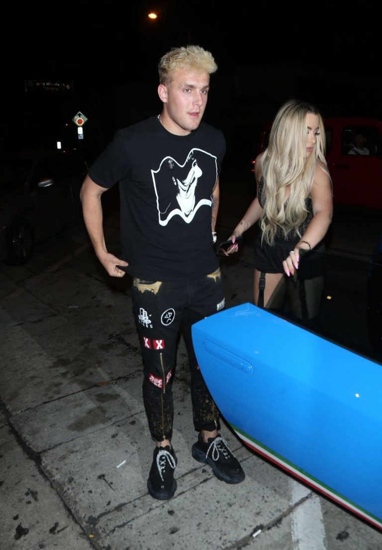 Tana Mongeau Pictures Tana Mongeau sexy cleavage in a revealing little outfit with Jake Paul.