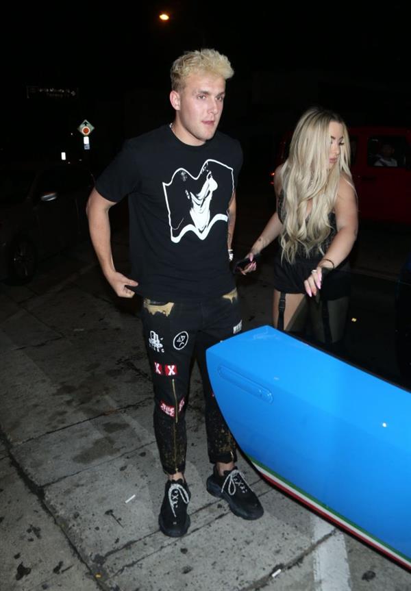 Tana Mongeau sexy cleavage in a revealing little outfit with Jake Paul.











