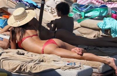 Alessandra Ambrosio perfect model body in a sexy little thong bikini seen at the beach by paparazzi showing nice cleavage and ass.





















