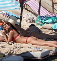 Alessandra Ambrosio perfect model body in a sexy little thong bikini seen at the beach by paparazzi showing nice cleavage and ass.





















