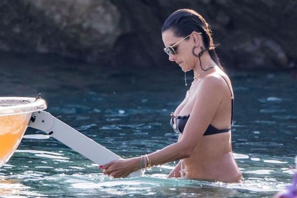 Alessandra Ambrosio sexy at the beach in a thong bikini and flashing her pussy to her boyfriend seen by paparazzi.











