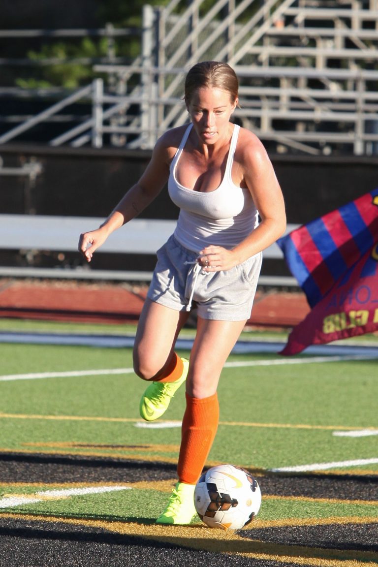 Kendra Wilkinson Pictures Kendra Wilkinson braless boobs showing her tits pokies seen by paparazzi playing soccer seen by paparazzi.