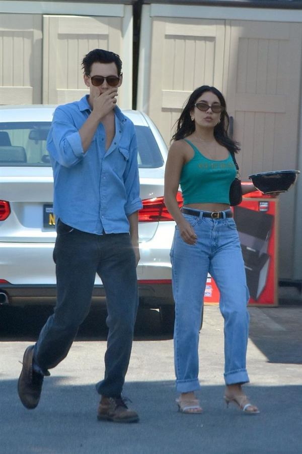 Vanessa Hudgens braless nipples pokies in a green top showing off her tits seen by paparazzi with Austin Butler.


















