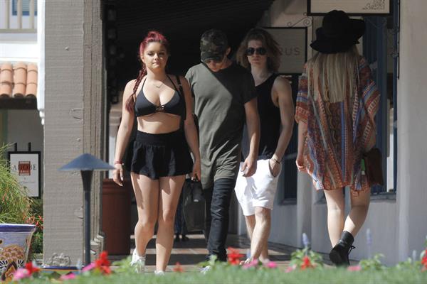 Ariel Winter paparazzi pictures in black bikini top and short skirt