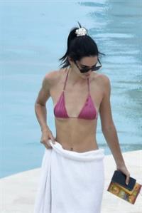 Kendall Jenner with Kourtney Kardashian sexy asses in thong bikinis seen by paparazzi.

