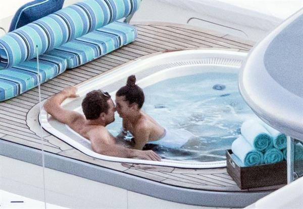 Camila Morrone in a sexy swimsuit in a hot tub on a yacht with Leonardo DiCaprio seen by paparazzi.










