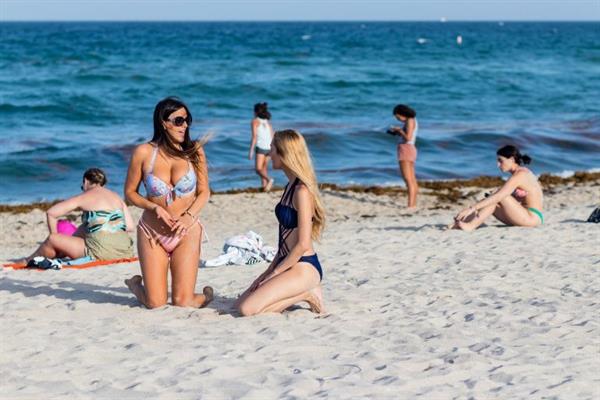 Claudia Romani and Lucia Luciano seen at the beach in a sexy ass thong bikini also showing nice cleavage seen by paparazzi.














