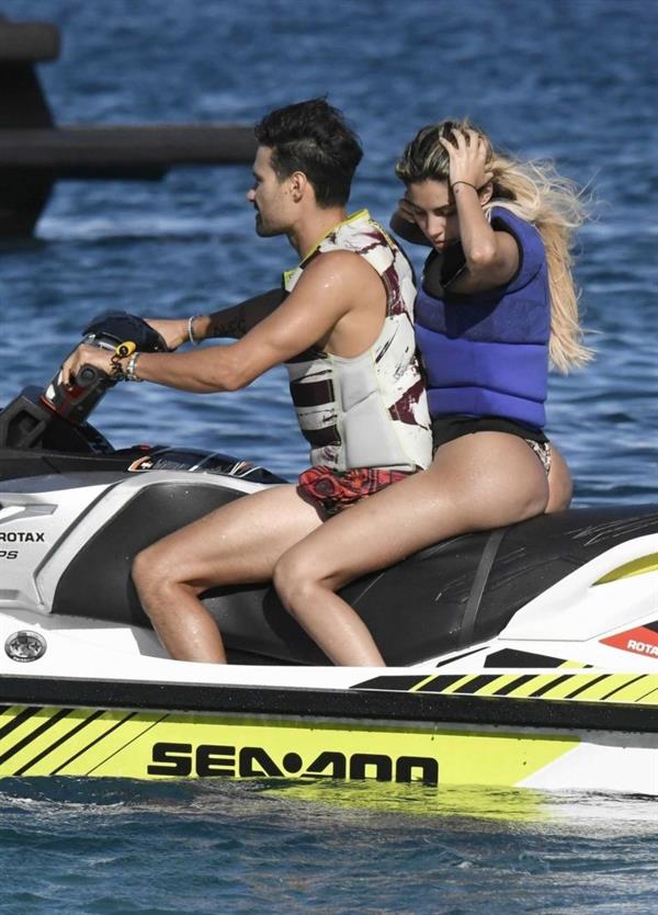 Alexa Dellanos sexy ass in a thong bikini also showing nice cleavage out on the water with her boyfriend Alec Monopoly seen by paparazzi.















