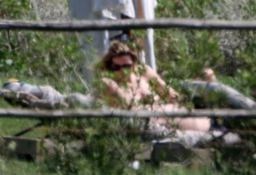 Alejandra Silva caught topless with her nude boobs exposed by paparazzi on vacation.
