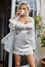 Caroline Vreeland sexy lingerie photo shoot showing her sexy ass and cleavage with her famous big boobs in just a bra and panties.









