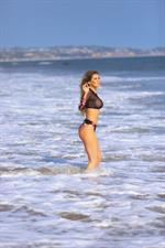 Ana Braga boobs in a fully see through top at the beach showing her tits seen by paparazzi.


