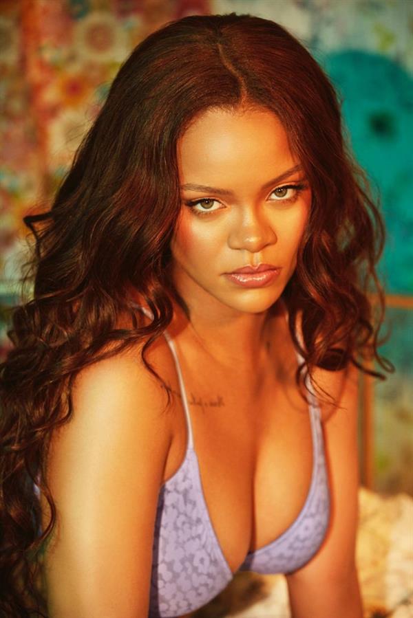 Rihanna sexy new fenty lingerie photo shoot photos showing nice cleavage.




