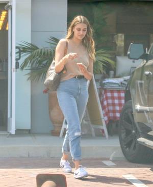 April Love Geary braless tits seen by paparazzi.



