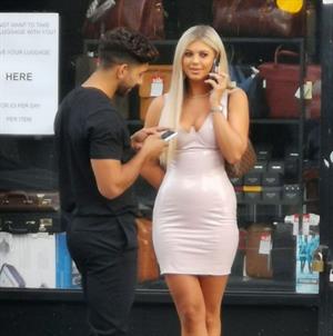 Belle Hassan wardrobe malfunction as the ass of her dress rips she had to call someone to sew it seen by paparazzi.




