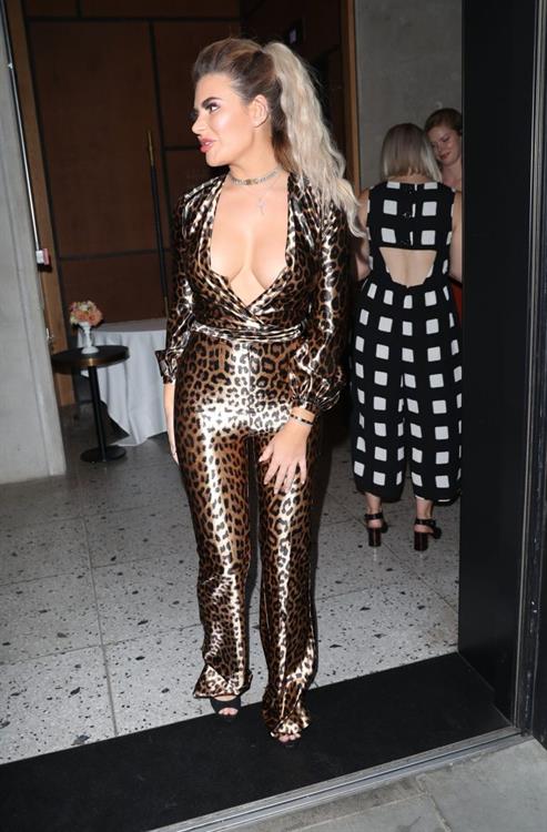 Megan Barton Pictures Megan Barton nip slip flash seen by paparazzi as she shows off her braless big boobs in London.