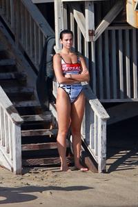 Dua Lipa sexy ass and cleavage in a swimsuit at the beach seen with her boyfriend by paparazzi.













