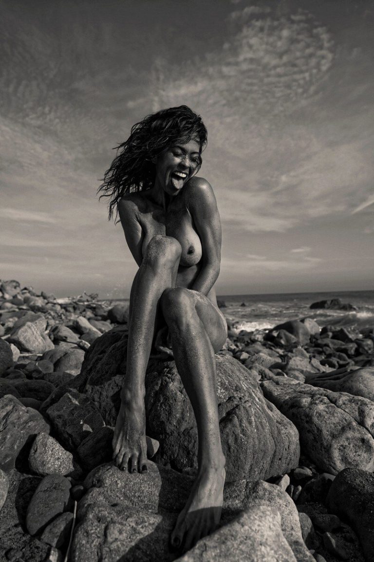 Brooke Burke nude photo shoot showing her topless boobs at the beach.
