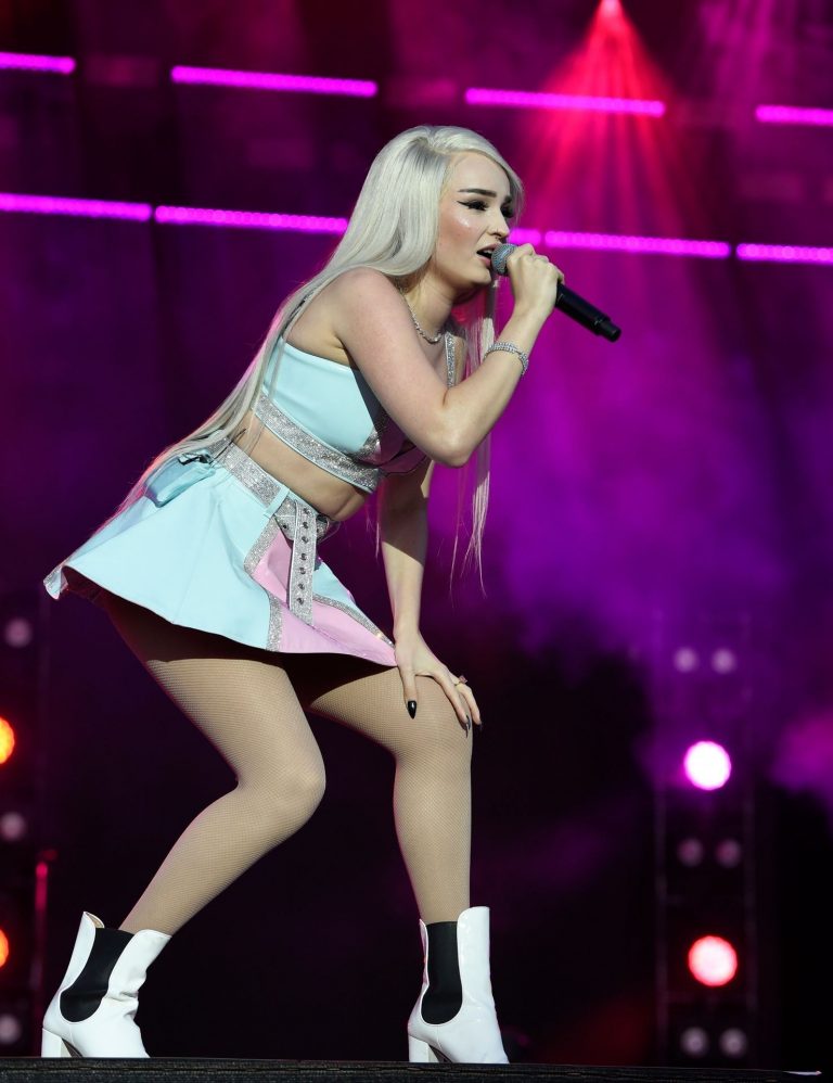 Kim Petras Pictures Kim Petras upskirt on stage singing and showing her panties.