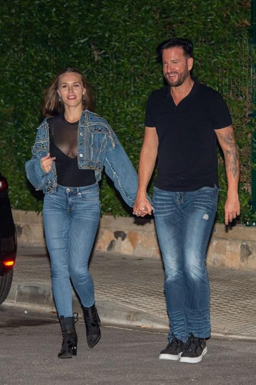 Laura Müller braless boobs in a see through top showing nice cleavage seen by paparazzi.









