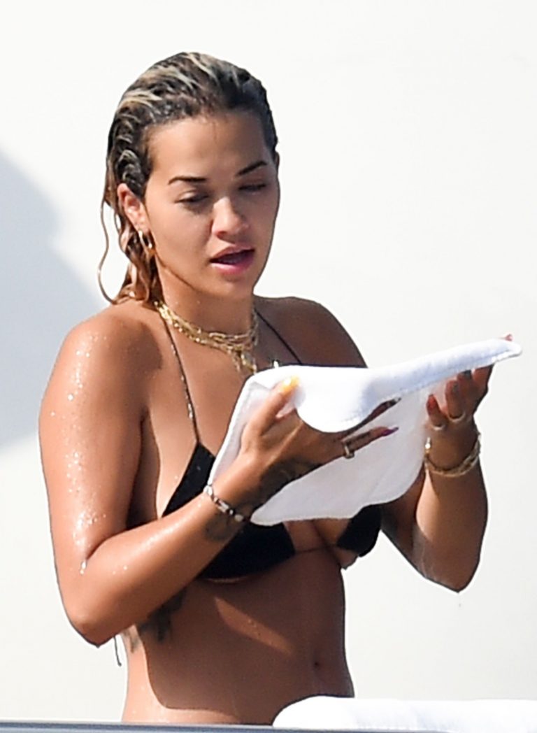 Rita Ora sexy ass and boobs in a thong bikini showing nice cleavage on a yacht seen by paparazzi.





























