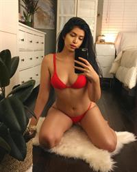 Lainie Love in a bikini taking a selfie