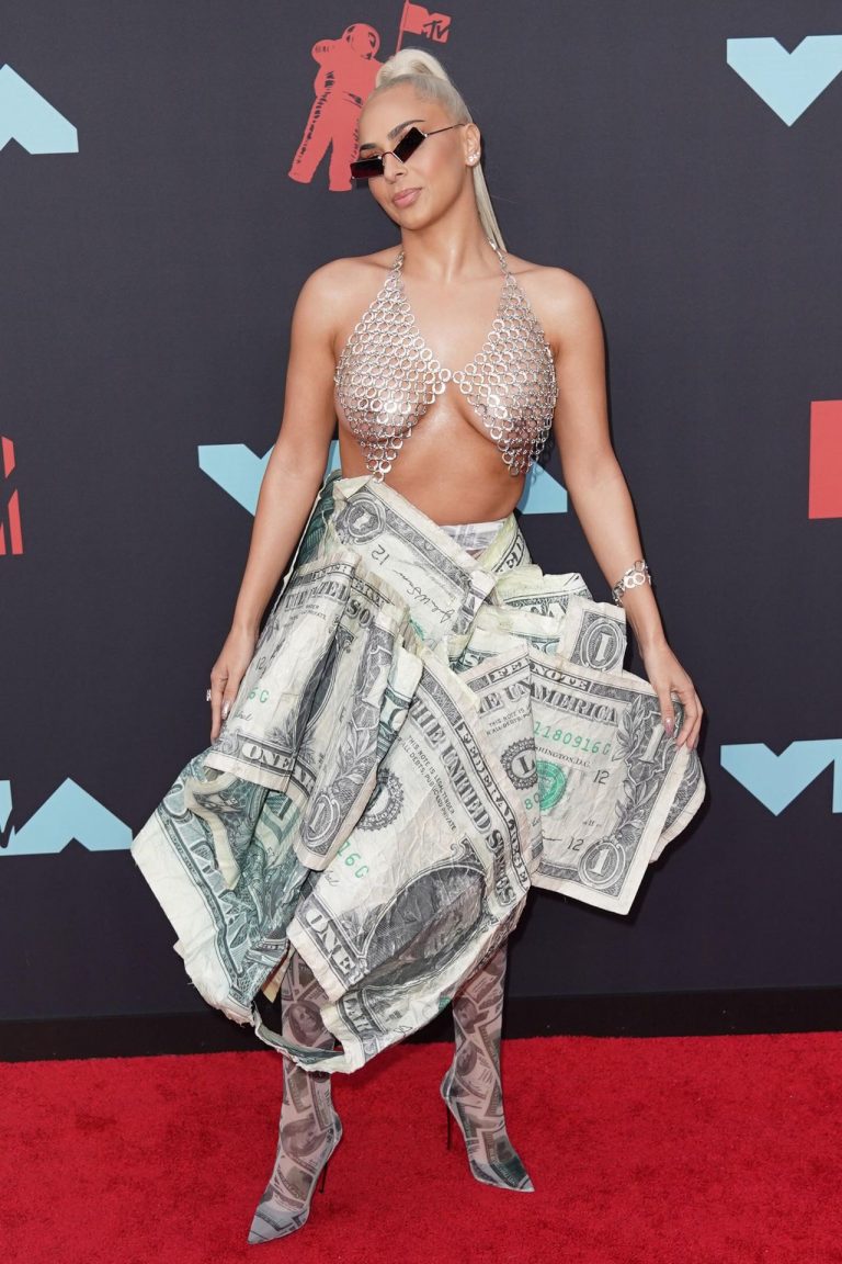 Veronica Vega Pictures Veronica Vega showing off her braless boobs on the red carpet at the MTV VMA's in a see through top.
