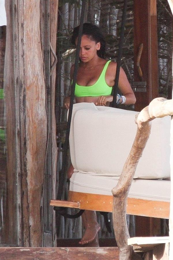 Vanessa Morgan in a tight green bikini showing nice cleavage and her sexy ass seen by paparazzi.




















