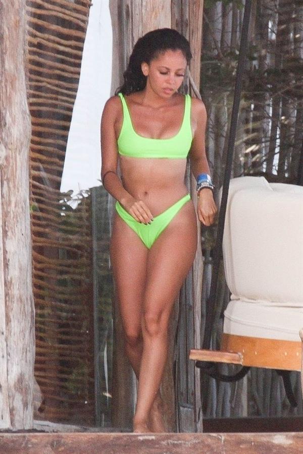 Vanessa Morgan in a tight green bikini showing nice cleavage and her sexy ass seen by paparazzi.




















