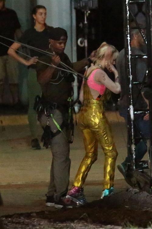 Margot Robbie sexy filming an action scene as Harley Quinn in the new movie  Birds of Prey .

















