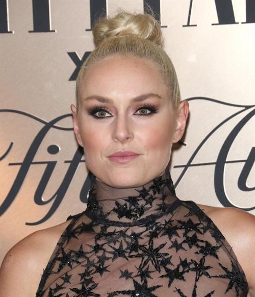 Lindsey Vonn Pictures Lindsey Vonn braless boobs in a see through outfit showing off her tits.